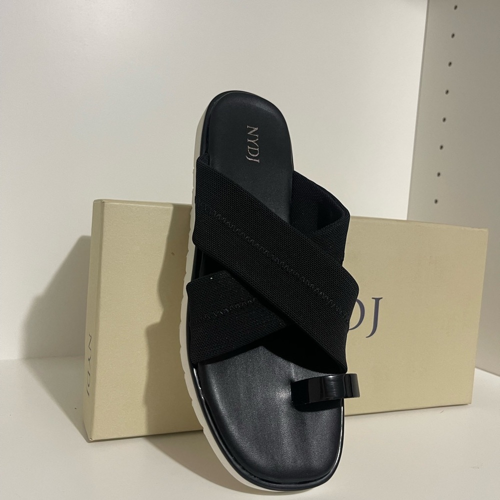 comfort as you walk on the streets wearing the NYDJ® Ronna footwear. - Picture 2 of 6